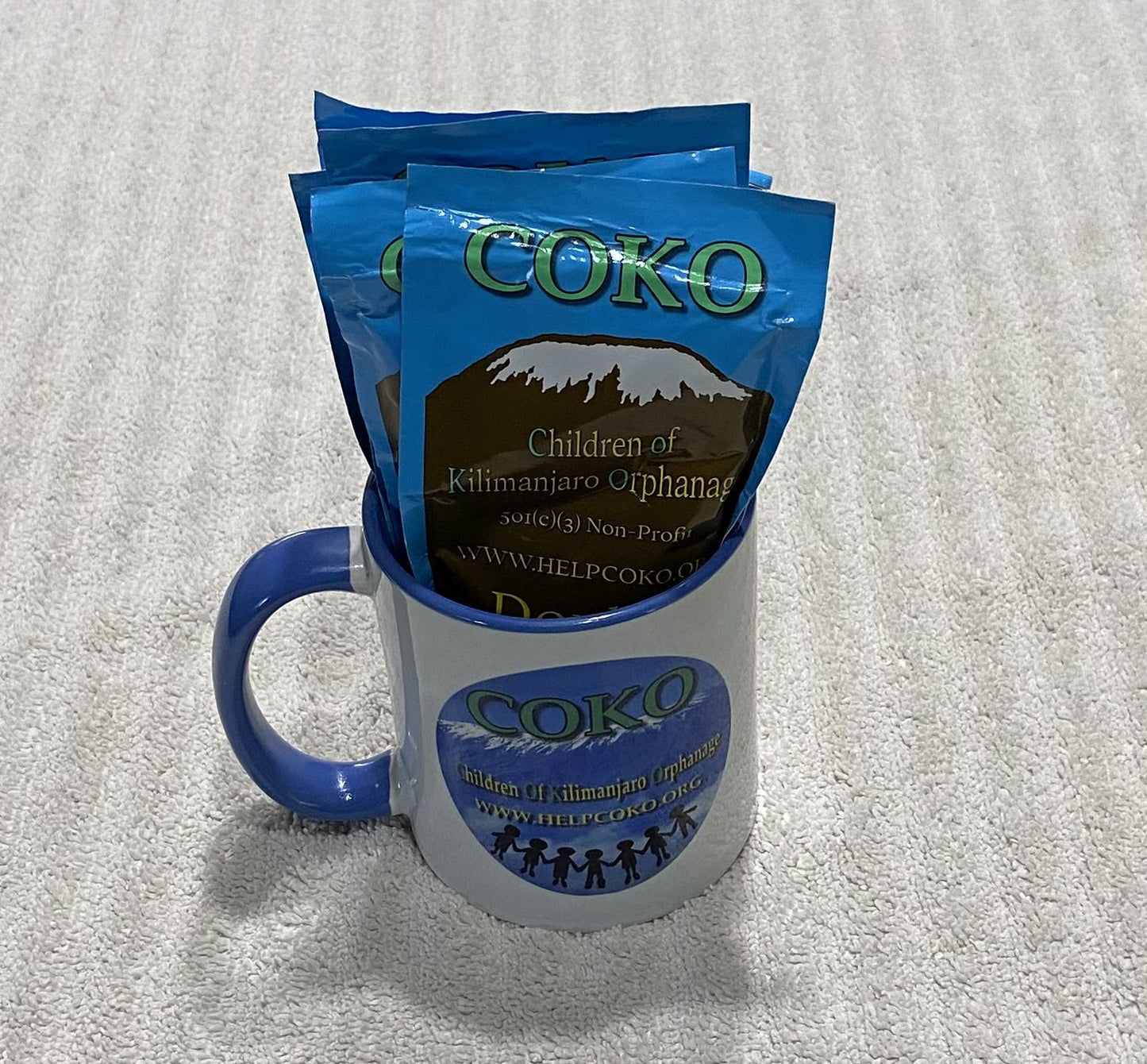 Coffee Mug with six packets of Cocoa